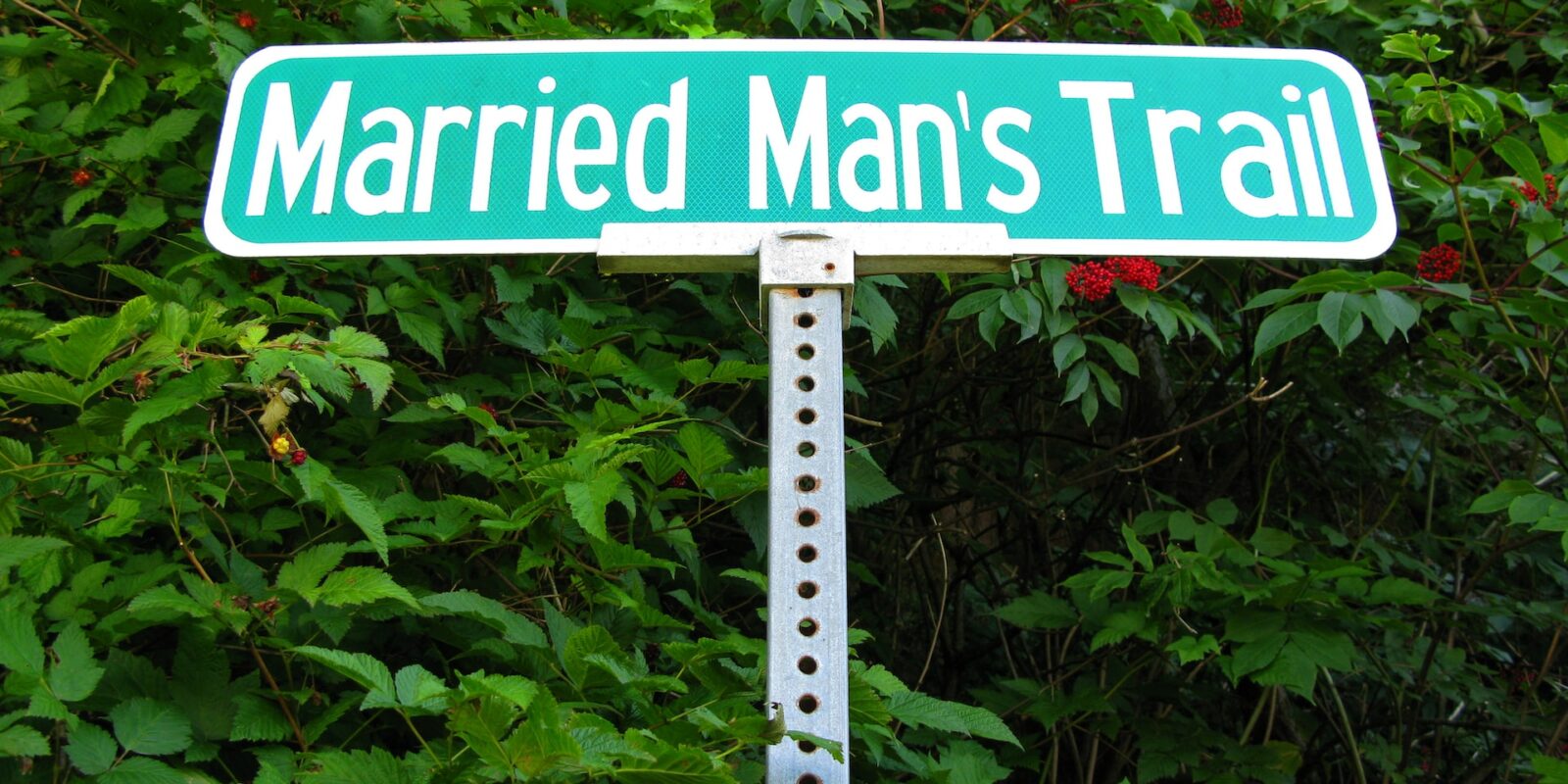 A sign which says married man's trail